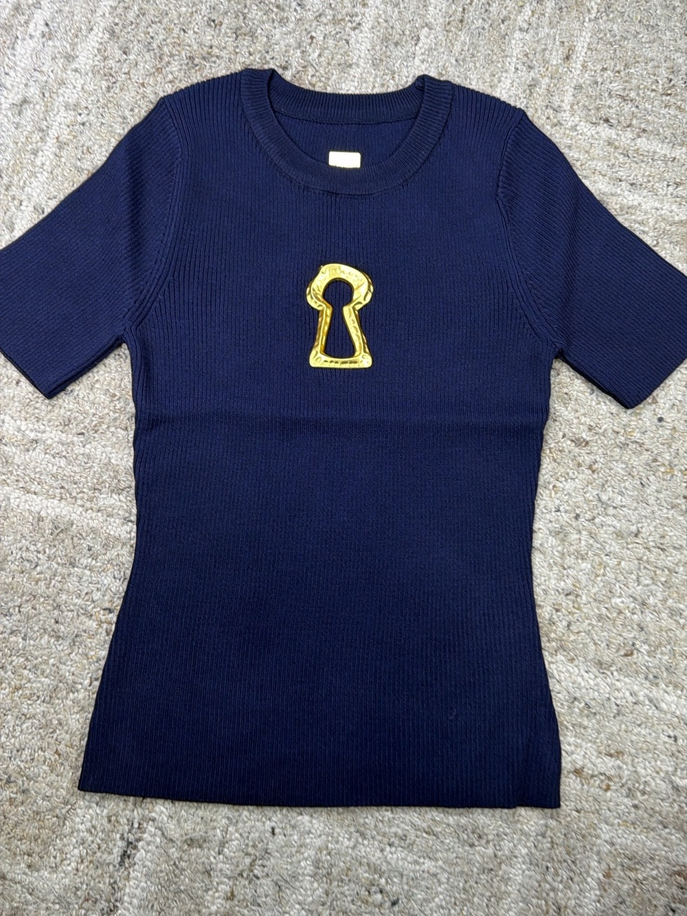 Navy Short-Sleeve Knit Top with Gold Keyhole Motif